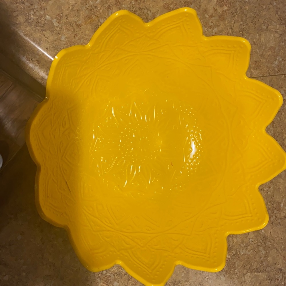 Yellow fruit bowl perfect for center table